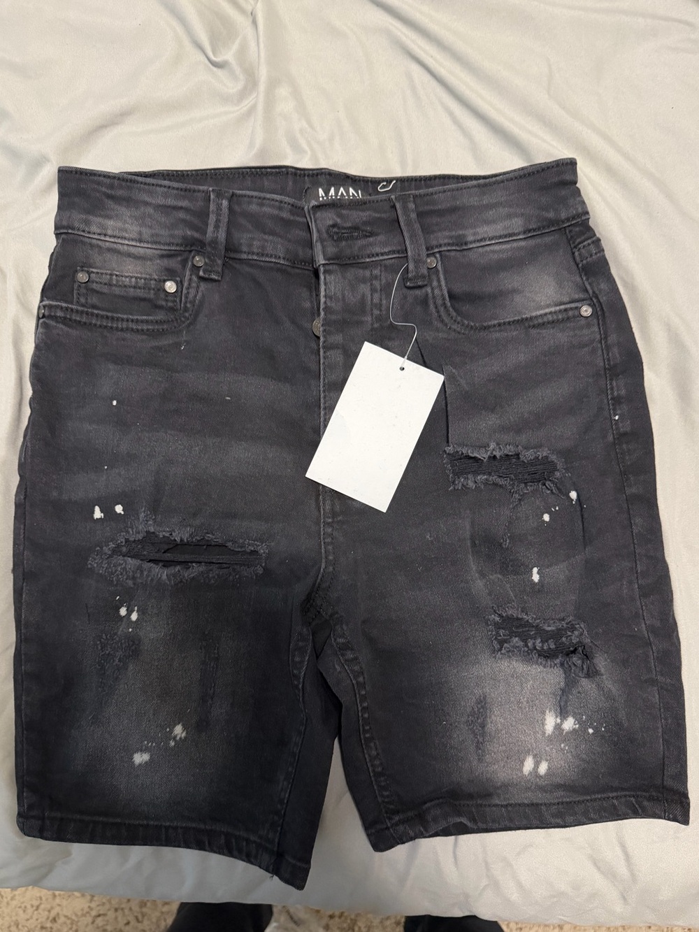 Men's Black Distressed Jean Shorts with Paint-Splash Detail